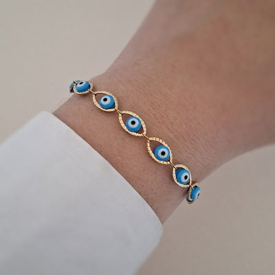 Pulsera protectora celeste - Dorado 