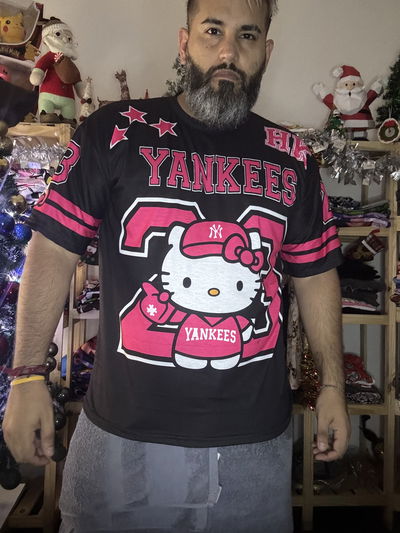 Remeron talle 6 kitty negro y rosa