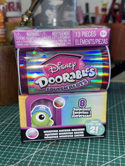 Doorables Lotso mini máquina con sorpresitas 