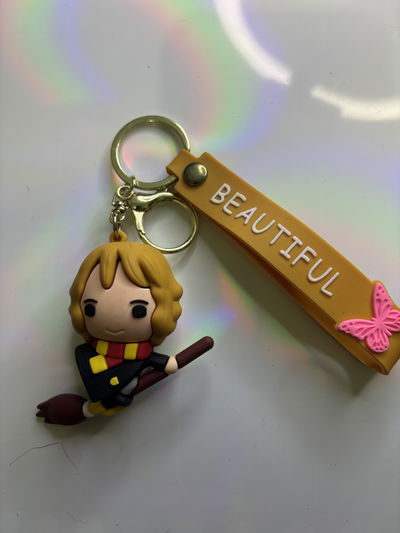 Llavero hermione escoba