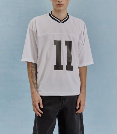 Remera boxy cuello tejido 