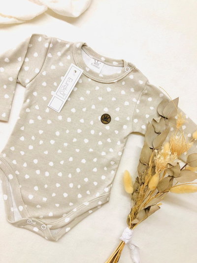 BODY BEIGE MANCHITAS BLANCAS