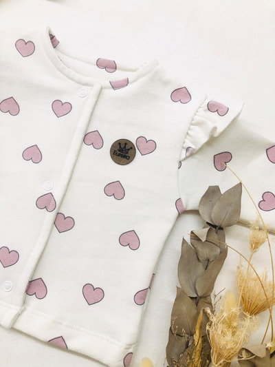 CAMPERA CORAZONES ROSA
