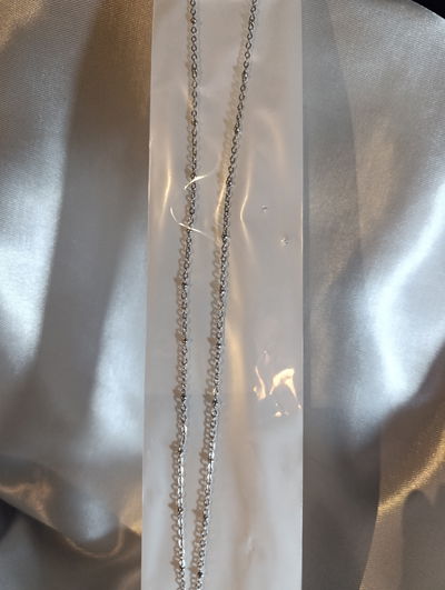 Cadena acero quirúrgico con perlas
