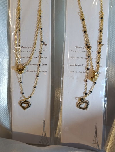 Collar acero quirúrgico dorado doble con Perlas doradas y dije corazon 