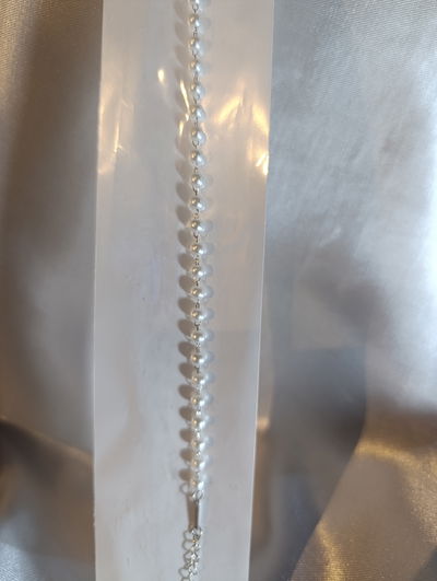 Pulsera acero quirúrgico con perlas blancas 