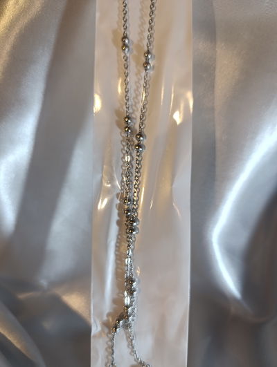 Collar acero quirúrgico con esferas doble