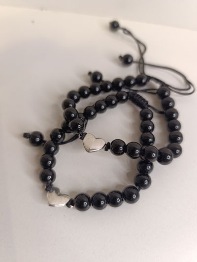 Pulsera para compartir perlas negras c/corazón 