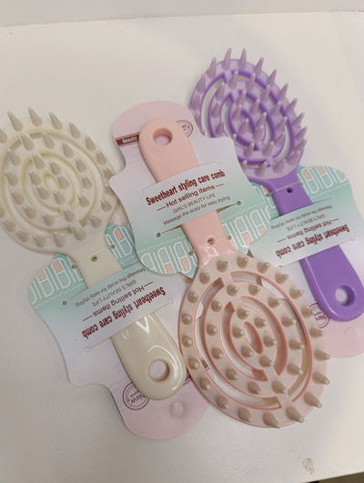 Cepillo masajeador para cabello