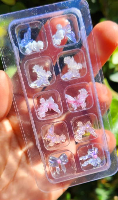 Mix dijes mariposa/moño