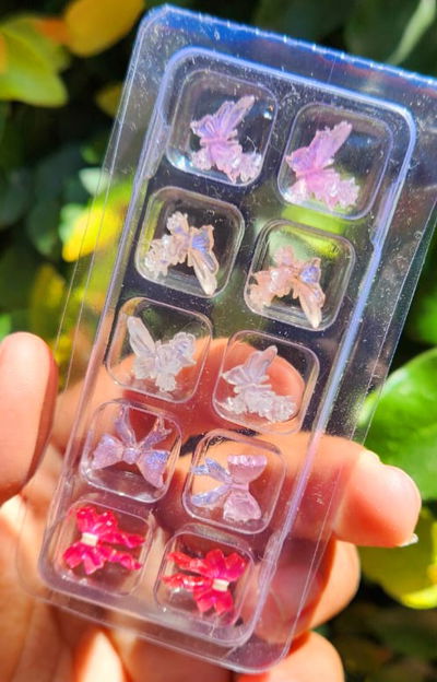 Mix dijes mariposa/moño