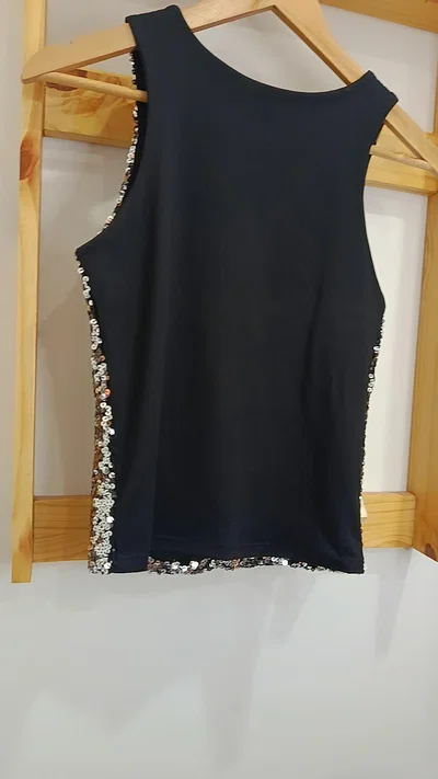 Remera lentejuelas 