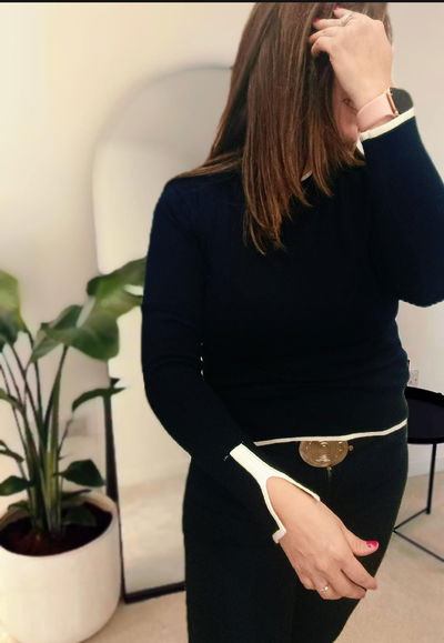 Sweter con ribetes 
