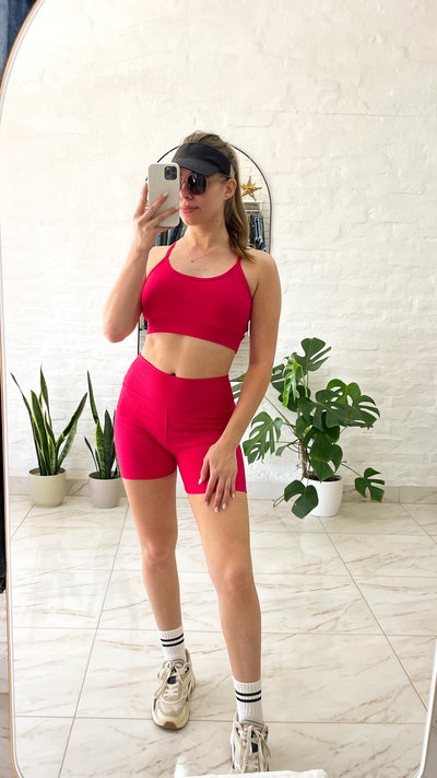 Conjunto deportivo fucsia