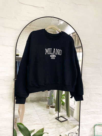 Buzo frisado y bordado 