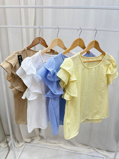 Blusa de simil lino texturado con vuelos 