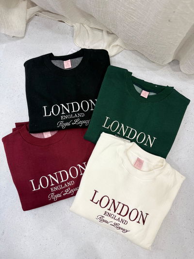 Buzo frisado cuello redondo bordado "LONDON" 