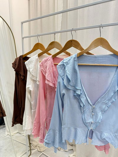 Blusa de simil lino con vuelos 