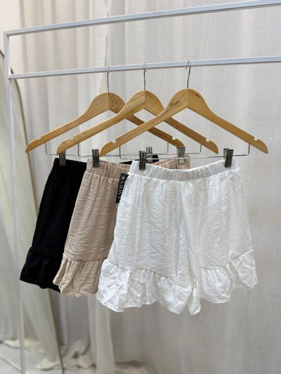Short de simil lino con vuelos 