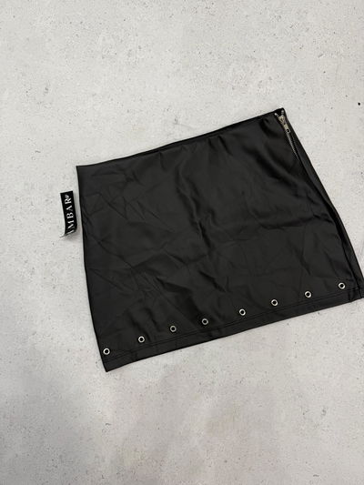 Pollera ecocuero con tachas 