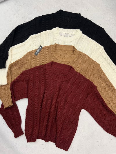 Sweater de lana trenzado cuello redondo 