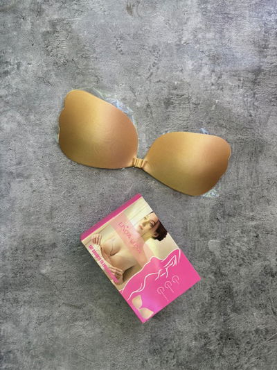 Corpiño mariposa con broche piel