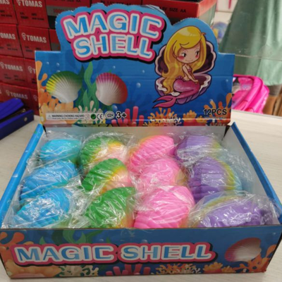 SQUISHY ANTI STRESS MAGIC SHELL CAJA X12