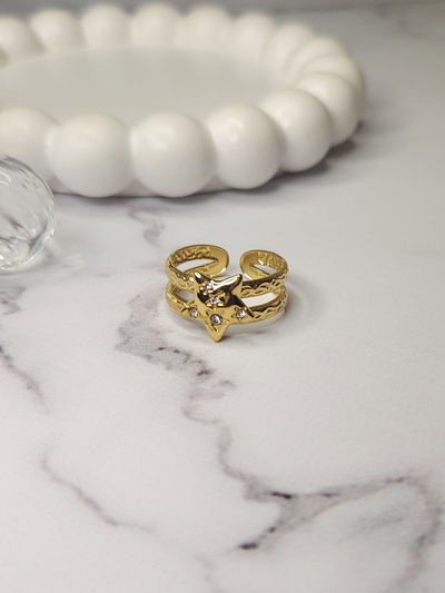 ANILLO ESTRELLA TRAMADA CUBIC GOLD