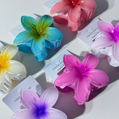 Broches de flor