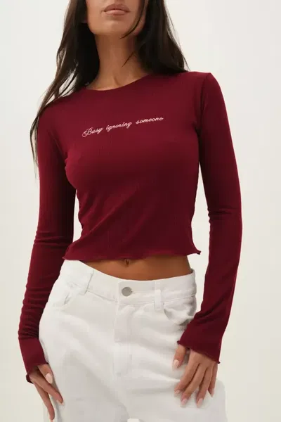 Remera M/L Busy Ignoring Someone
