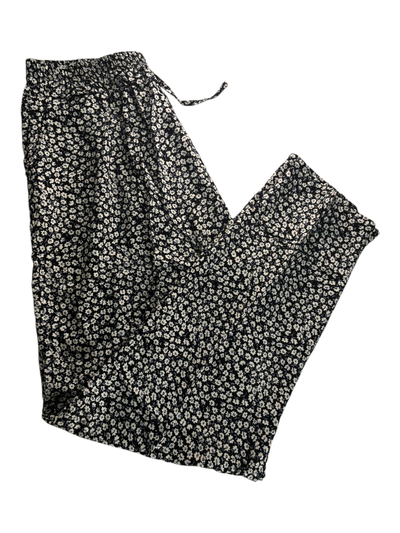 Pantalon fibrana negro con mini flores blancas talle 10