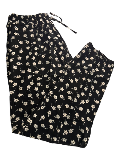 Pantalon fibrana negro con mini flores blancas  talle 10