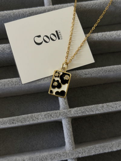 Chapita Cow Print de oro laminado y cadena enchapada