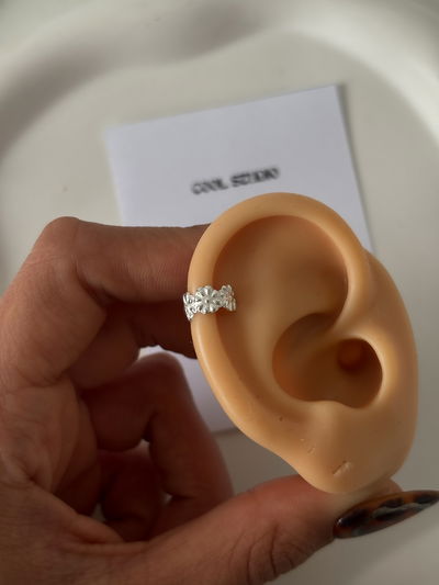 Cuff a presión flores  (unidad) 