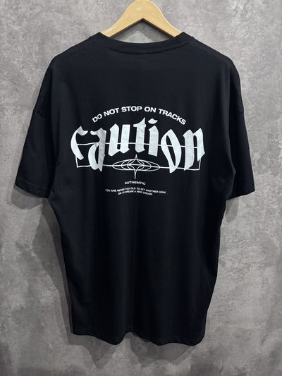 Remera over caution 
