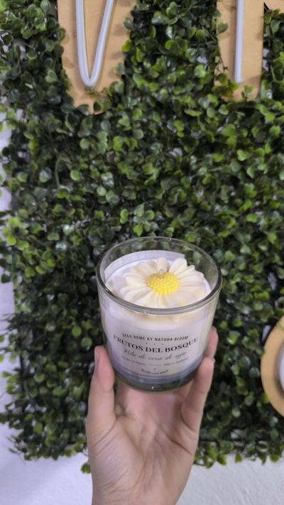 Vela aromatica en envase de vidrio