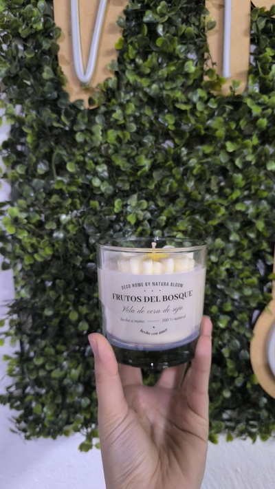 Vela aromatica en envase de vidrio