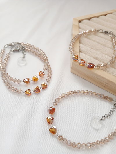 PULSERA - CORAZONES CRISTAL CARAMELO