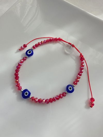 TOBILLERA - OJITOS ROJA REGULABLE