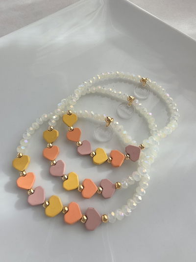 PULSERA - ORO LAMINADO CORAZONES HEMATITE PASTEL