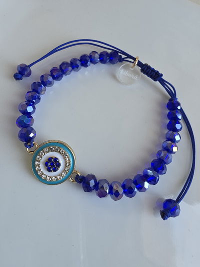 PULSERA - OJITO STRASS AZUL REGULABLE