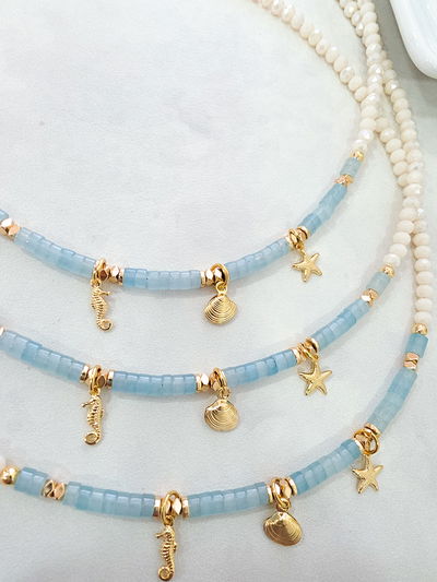 COLLAR - ORO LAMINADO - MULTI DIJE AGUAMARINA