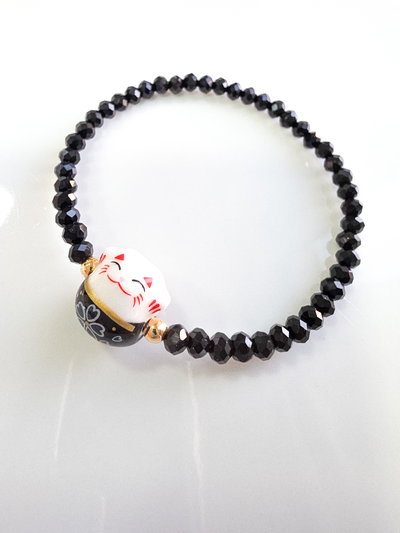PULSERA - ORO LAMINADO - MANEKI NEKO NEGRA