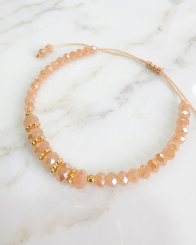 PULSERA - ORO LAMINADO - NUDE REGULABLE