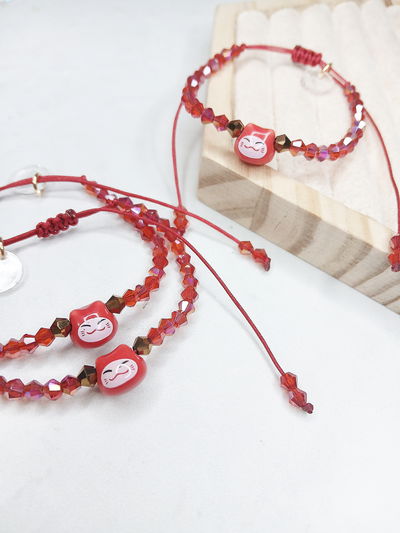 PULSERA - MANEKI ROJA REGULABLE