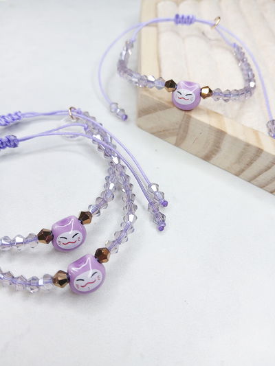 PULSERA - MANEKI LILA REGULABLE