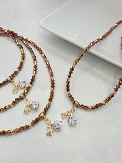 COLLAR - ORO LAMINADO - TULIPAN MICROZIRCONIAS Y CUBIC