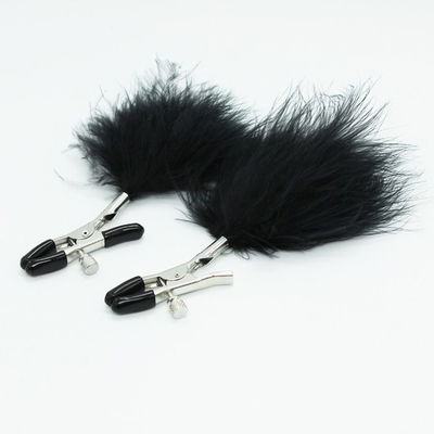 Pinzas para pezones con plumas