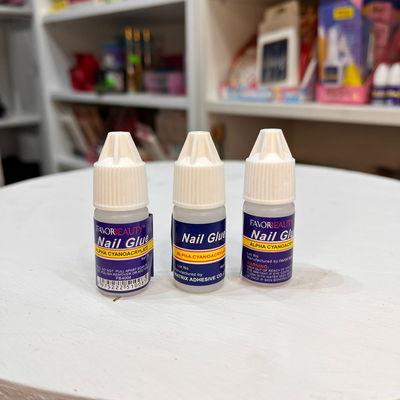 Pegamento de uñas gotero