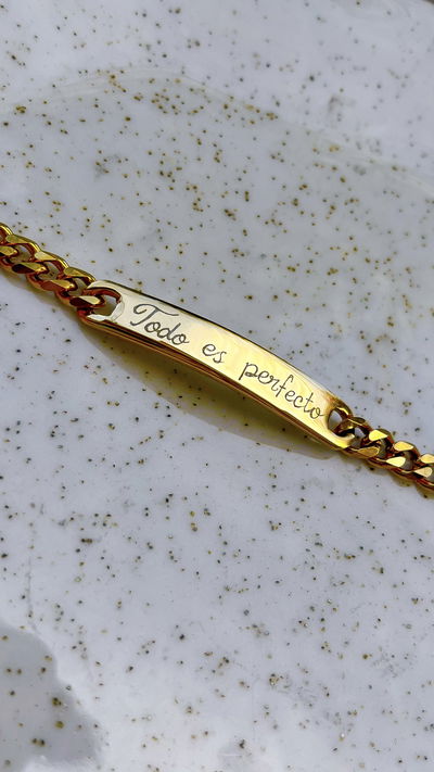 PULSERA ACERO DORADO